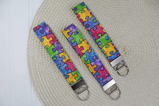 Faded Puzzle Piece Wristlet(NOT RESTOCKING)