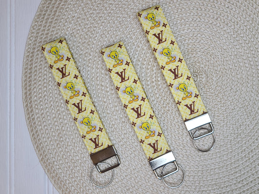 Inspired Yellow Bird Wristlet